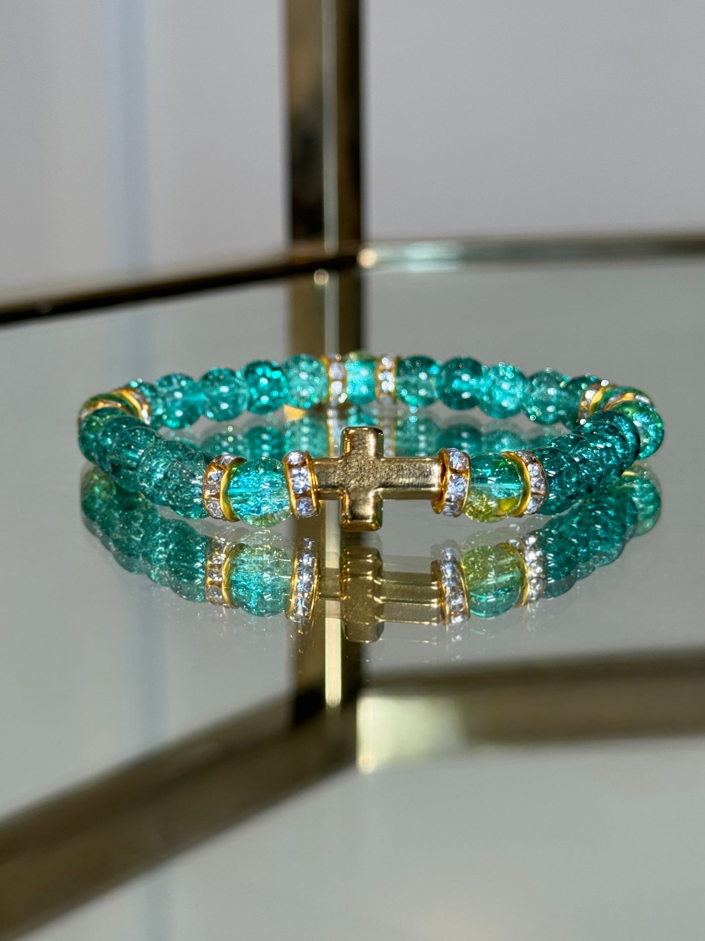 Gold Cross Charm Bracelet in Deep Aqua